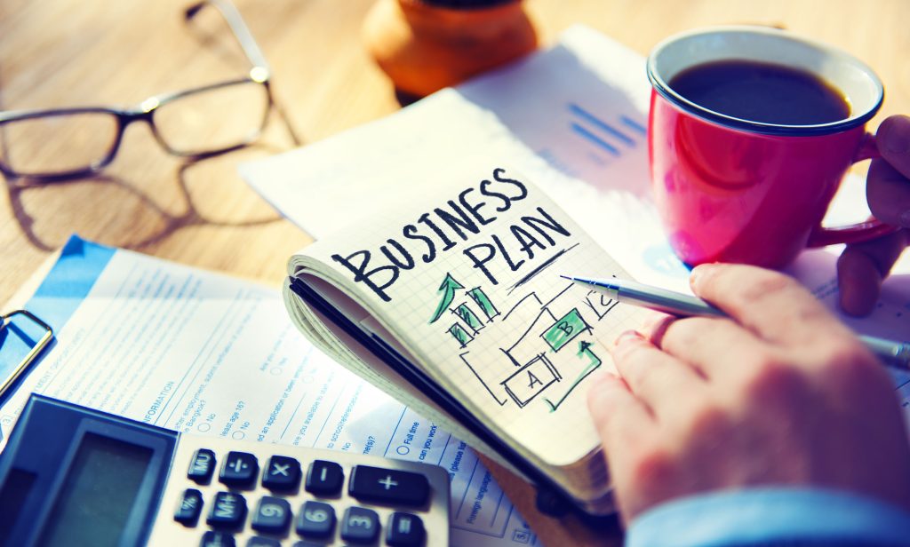 35337758 - businessman writing business plan growth concept
